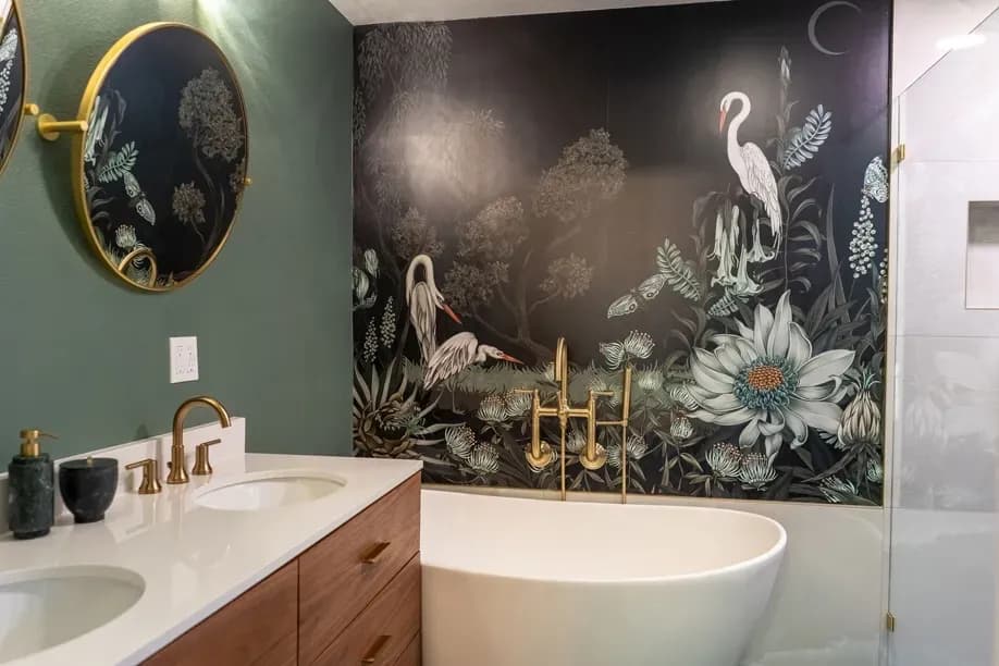 Completed spa-style bathroom remodel by Tubro Construction with a freestanding soaking tub and custom tile